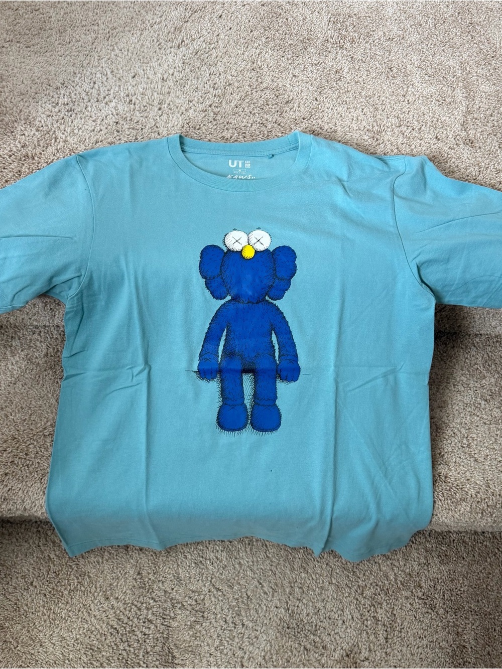 Uniqlo x KAWS Light Blue Tee with Blue Character Graphic